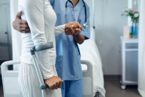 Nurse helping patient